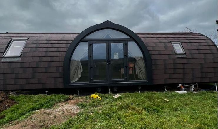 Glamping pod with Metrotile Burnt Umber roof