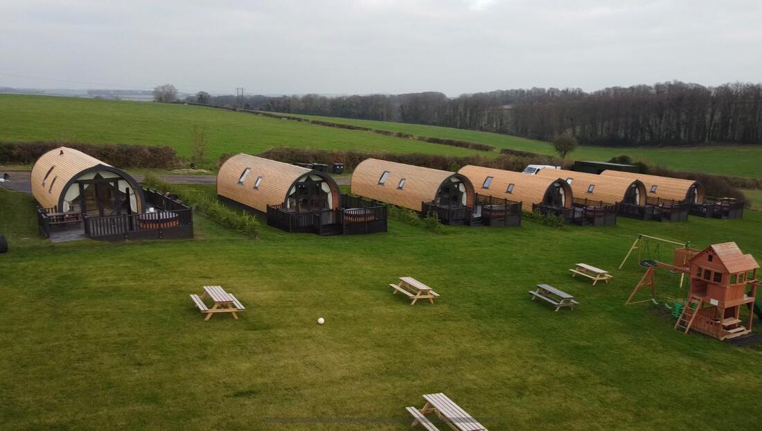 Glamping pod with hot tubs